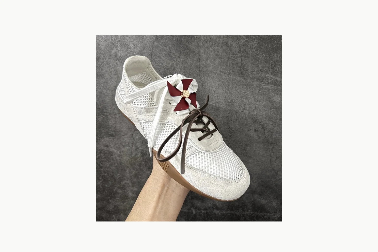Miu Miu White Bow Sneaker Sheetbase record image with white bow-detail low-top with mixed-material upper and low-profile shape thumbnail 2