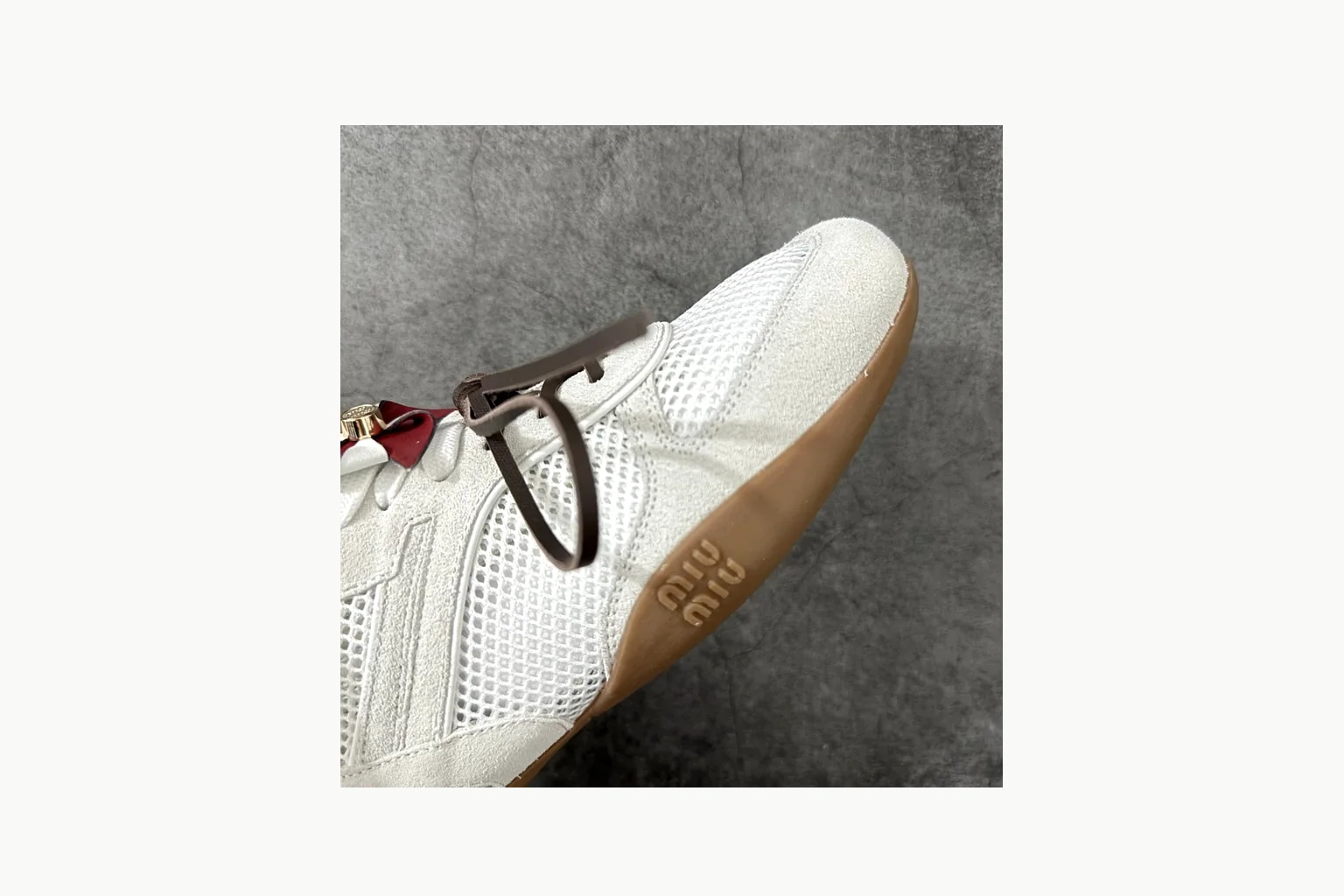 Miu Miu White Bow Sneaker Sheetbase record image with white bow-detail low-top with mixed-material upper and low-profile shape thumbnail 5