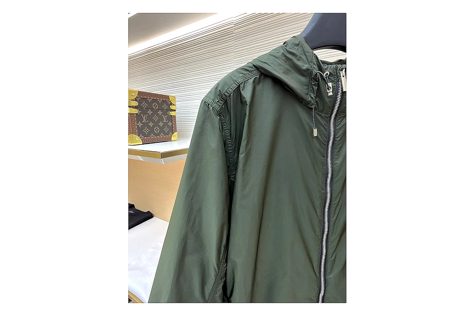Moncler Nylon Hooded Jacket Olive Jacket spreadsheet record image with olive nylon hooded jacket with nylon texture, hood structure, zipper line, sleeve cuffs, and light shell shape thumbnail 3