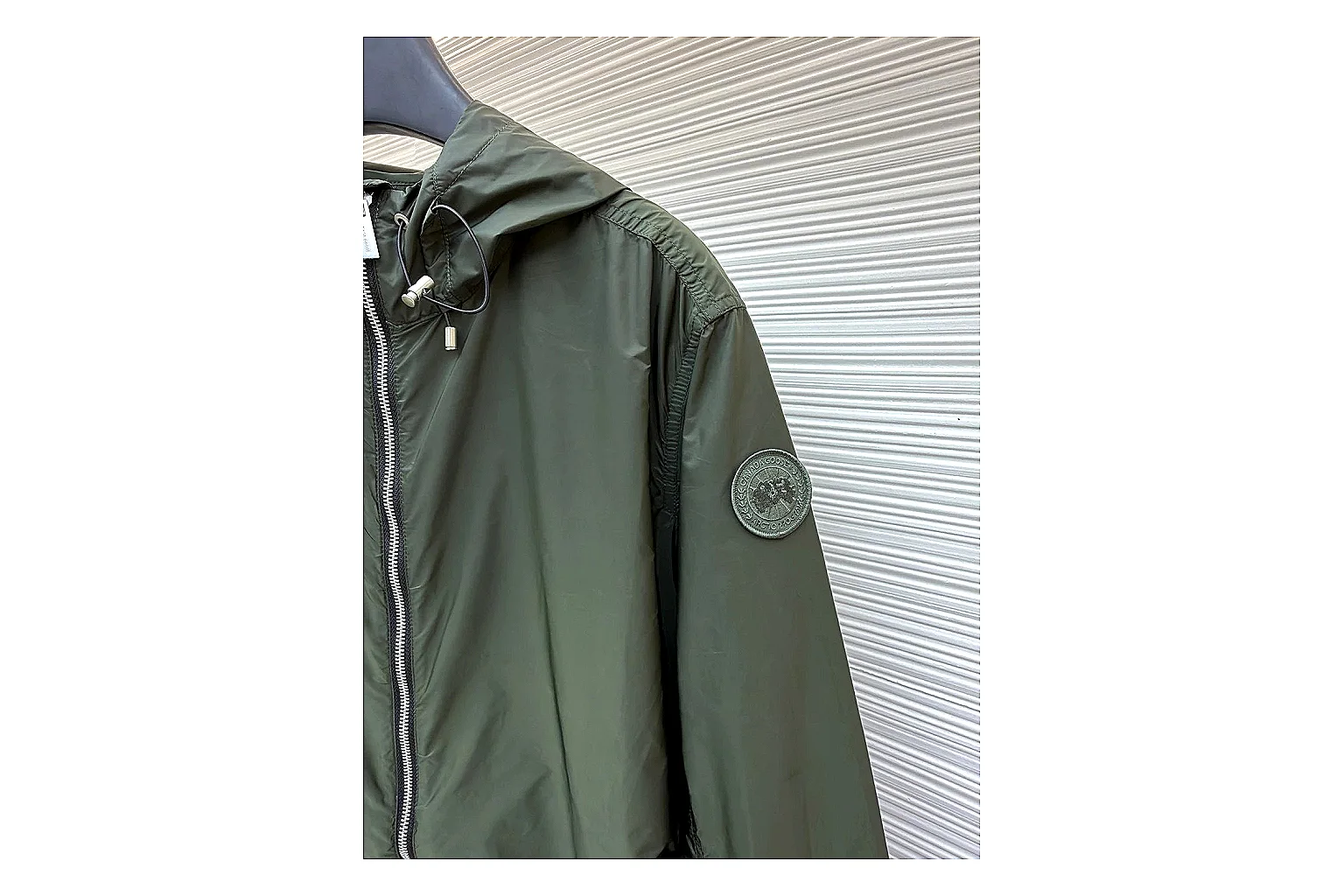 Moncler Nylon Hooded Jacket Olive Jacket spreadsheet record image with olive nylon hooded jacket with nylon texture, hood structure, zipper line, sleeve cuffs, and light shell shape thumbnail 5