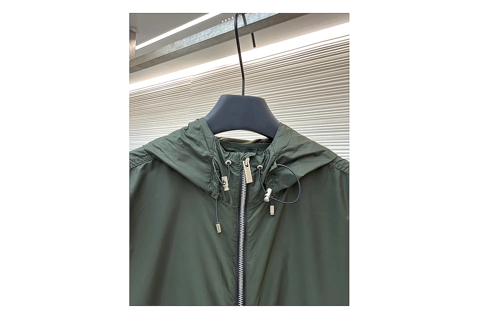 Moncler Nylon Hooded Jacket Olive Jacket spreadsheet record image with olive nylon hooded jacket with nylon texture, hood structure, zipper line, sleeve cuffs, and light shell shape thumbnail 6