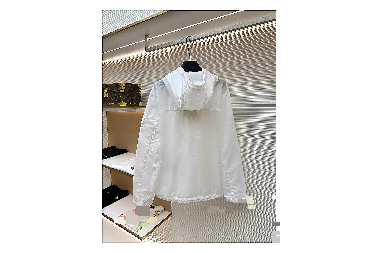 Moncler Nylon Hooded Jacket White Jacket spreadsheet record image with white nylon hooded jacket with nylon texture, hood structure, zipper line, sleeve cuffs, and light shell shape