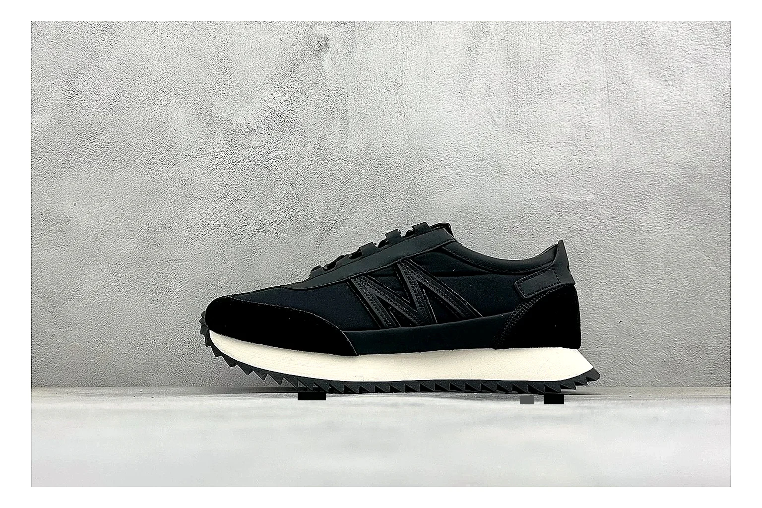 Moncler Pacey Black White spreadsheet record image showing black upper, white rugged outsole, low padded collar, and outdoor-leaning tread profile