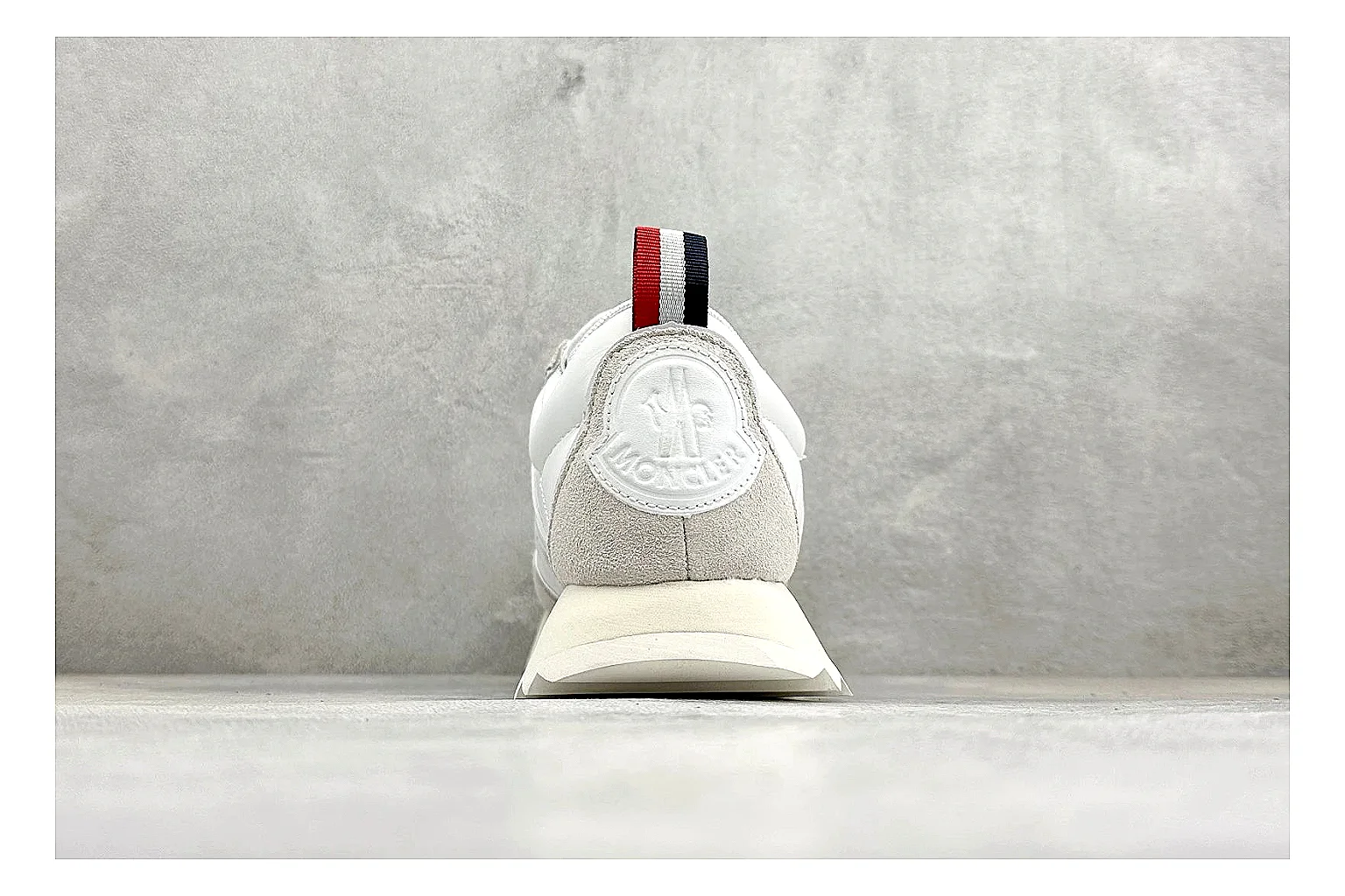 Moncler Pacey White Suede spreadsheet record image showing light suede upper, chunky serrated outsole, low padded collar, and tonal casual build thumbnail 3