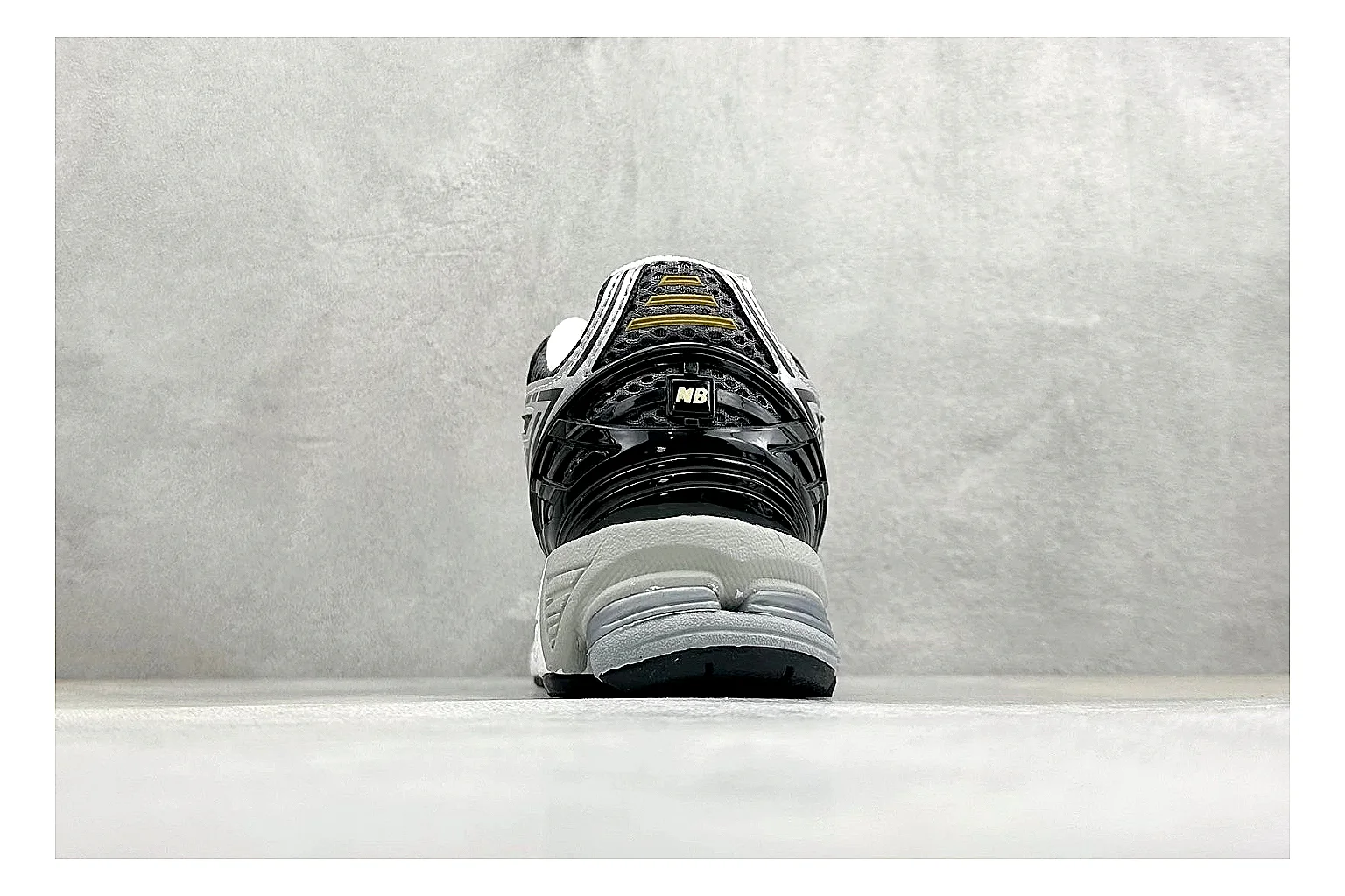 New Balance 1906 Black Silver spreadsheet record photo showing black mesh base, silver overlays, technical 1906 runner structure, and layered performance sole thumbnail 3