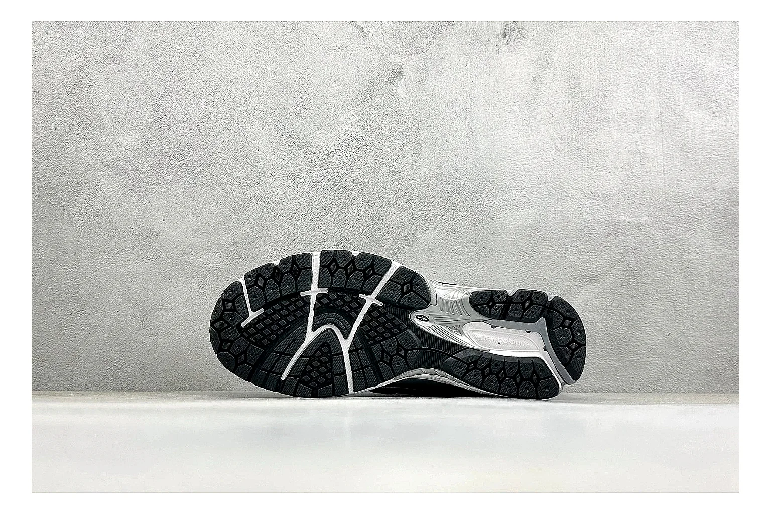 New Balance 1906 Black Silver spreadsheet record photo showing black mesh base, silver overlays, technical 1906 runner structure, and layered performance sole