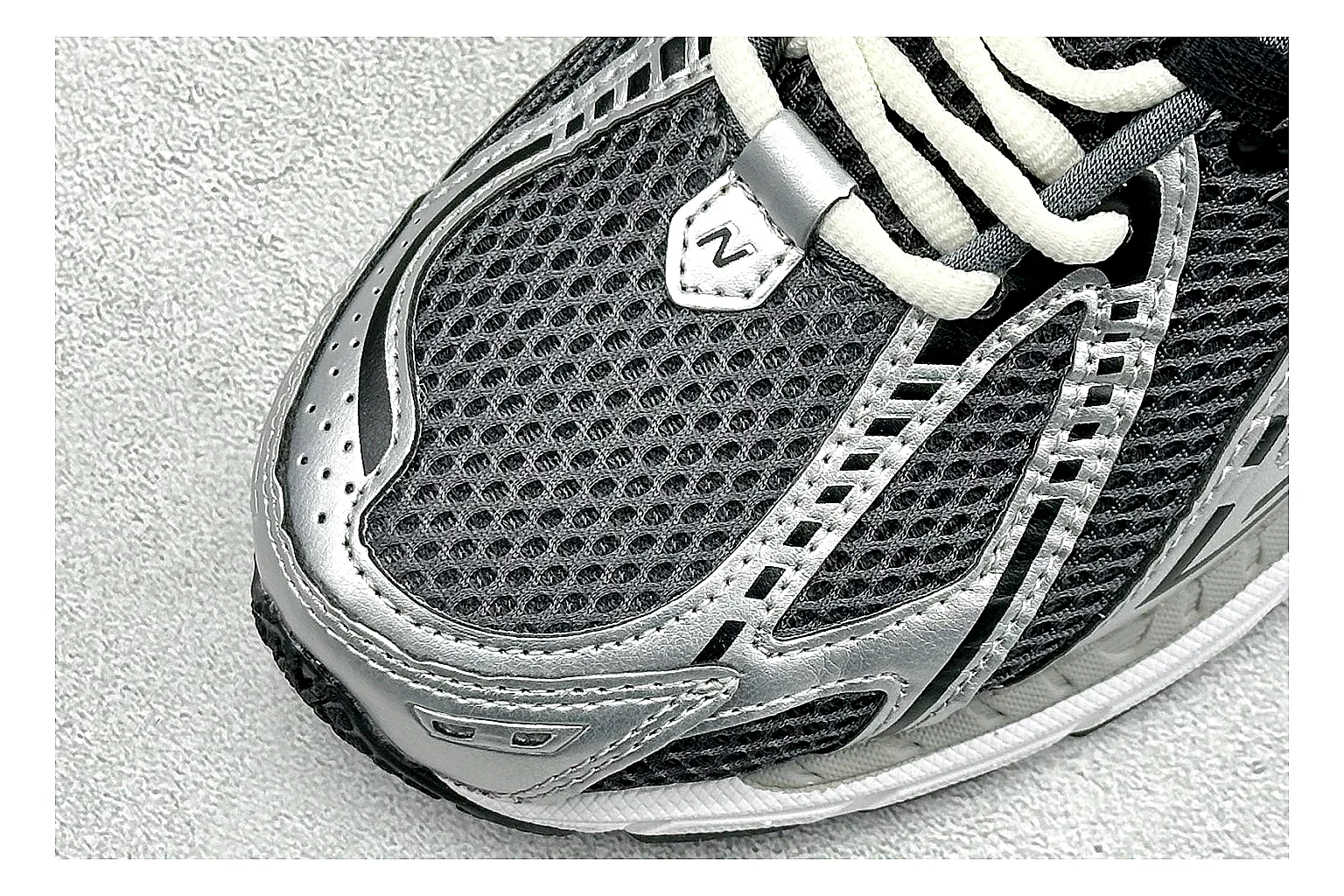 New Balance 1906 Black Silver spreadsheet record photo showing black mesh base, silver overlays, technical 1906 runner structure, and layered performance sole thumbnail 5
