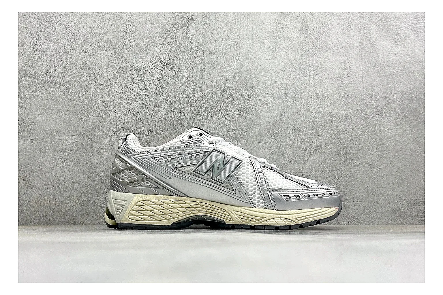 New Balance 1906 Silver Grey spreadsheet record image showing silver overlays, grey mesh panels, technical runner structure, and layered midsole tooling thumbnail 6