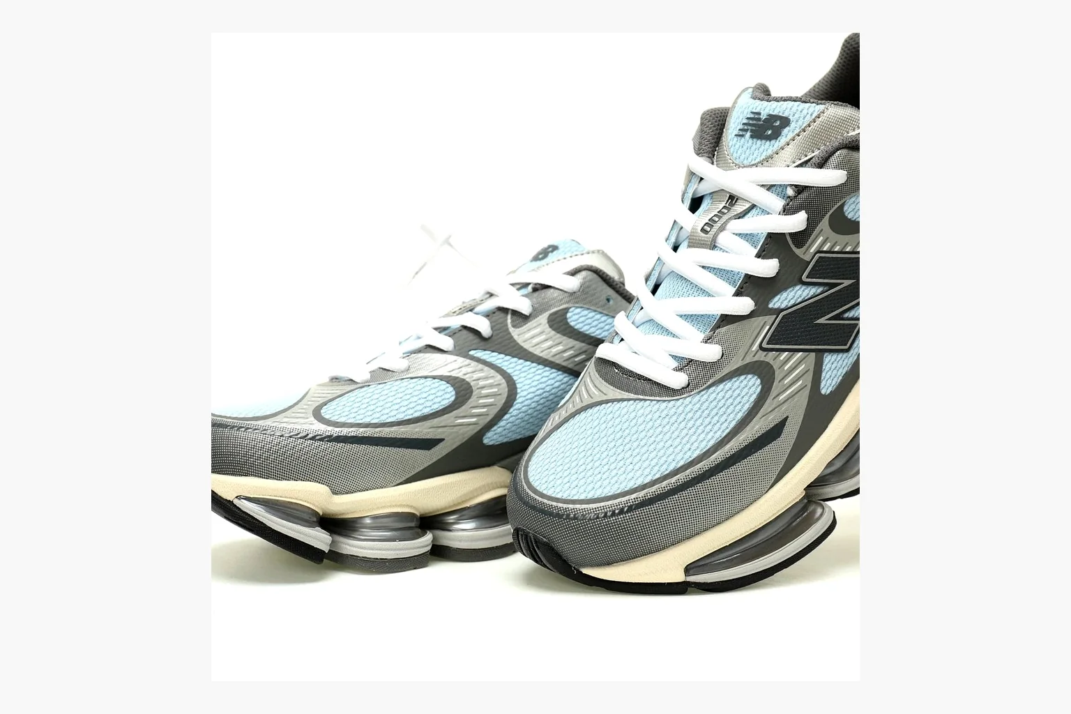 New Balance 9060 Runner Sneaker Silver Teal Sheetbase record image with silver and teal NB 9060 runner with chunky sole, mesh panels, and side N logo thumbnail 5