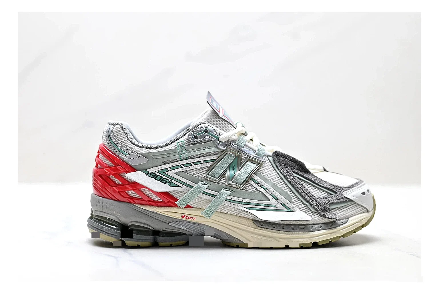 New Balance M1906 Silver Red Sneakers spreadsheet record image with silver red retro runner sneakers with mesh-leather texture, side-profile shape, upper panel lines, and outsole detail