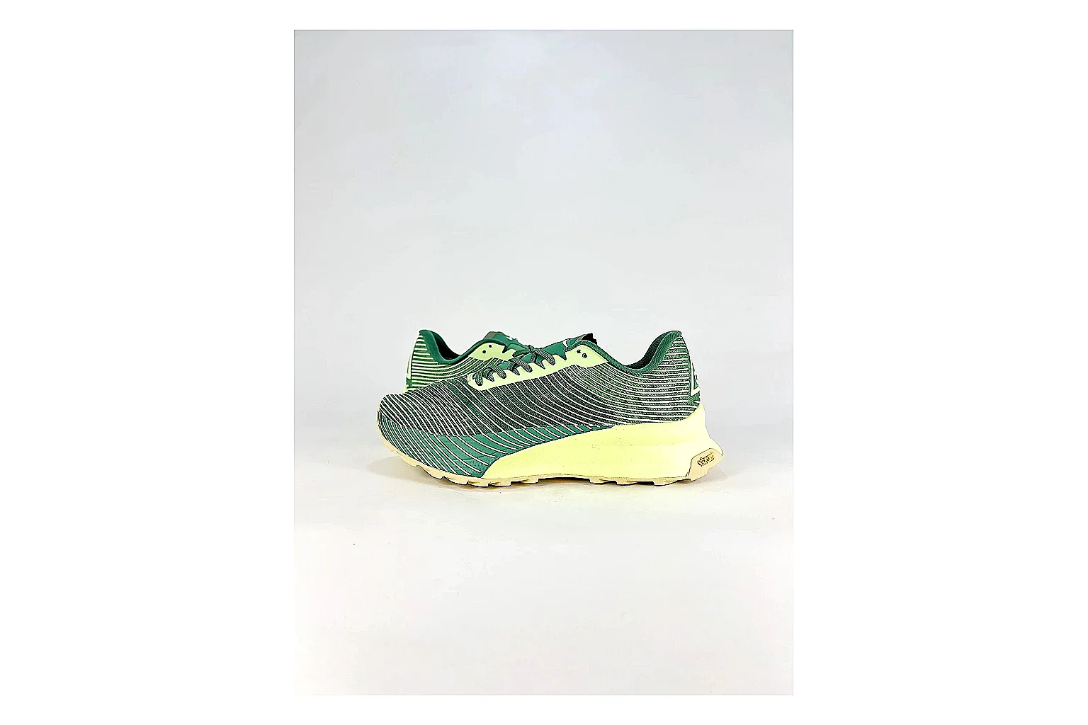 Nike ACG Ultra Green Lime Sneakers spreadsheet record image with green lime outdoor sneakers with textile texture, side-profile shape, upper panel lines, and outsole detail
