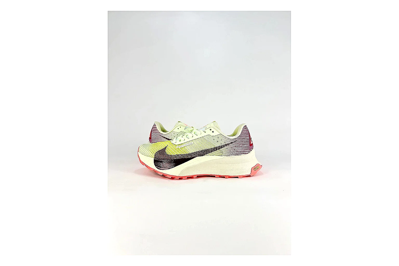 Nike ACG Ultra Lime Pink Sneakers spreadsheet record image with lime pink outdoor sneakers with textile texture, side-profile shape, upper panel lines, and outsole detail