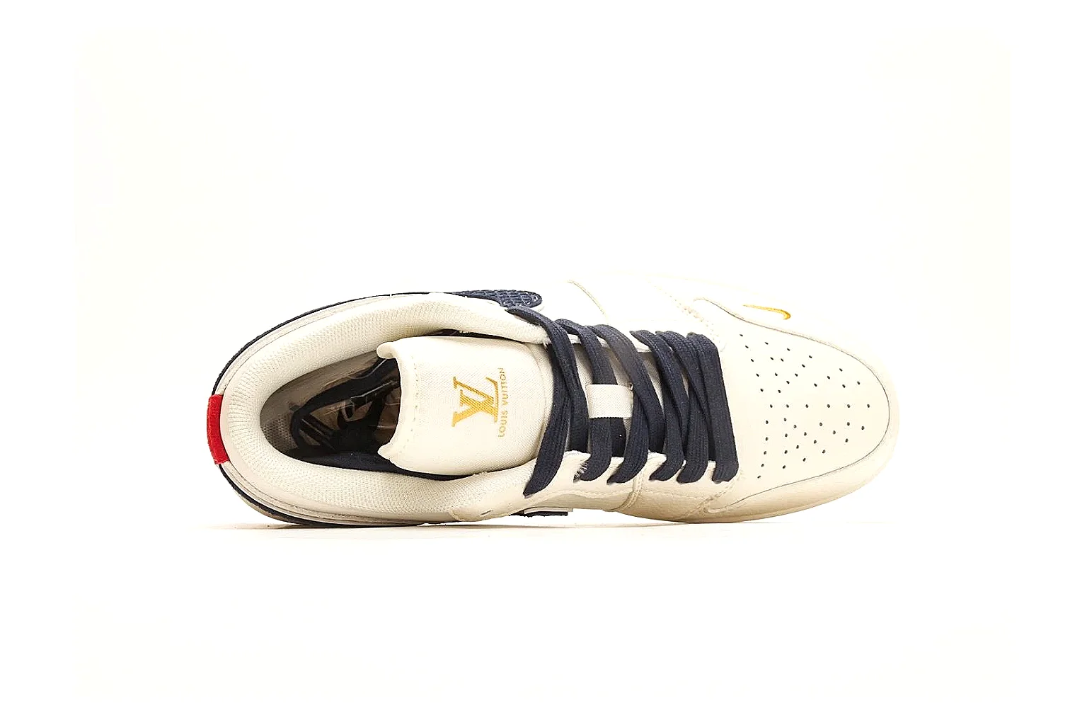 Nike Air Court Cream Navy Low Top spreadsheet record photo showing cream leather upper, navy Swoosh, dark laces, red heel accents, and gold side graphics thumbnail 2