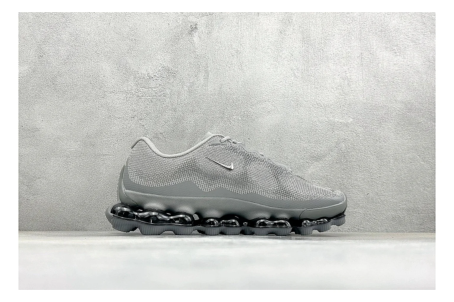 Nike Air Liquid Metal Silver spreadsheet record image showing reflective silver upper, running-inspired panels, sculpted pod outsole, and glossy tech finish thumbnail 6