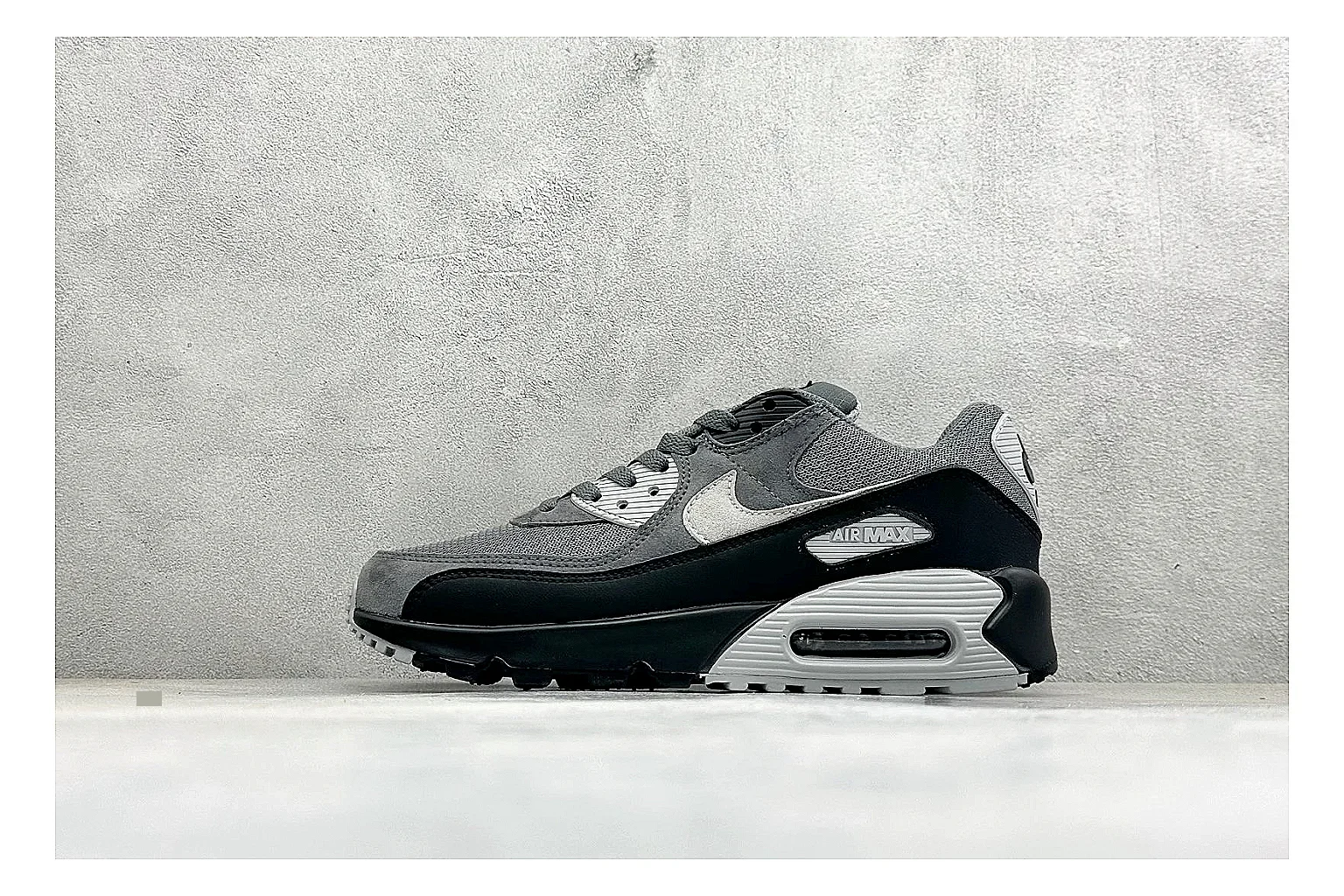 Nike Air Max 90 Grey Black spreadsheet record photo showing grey and black layered upper, visible Air window, classic Air Max 90 panels, and sturdy retro sole