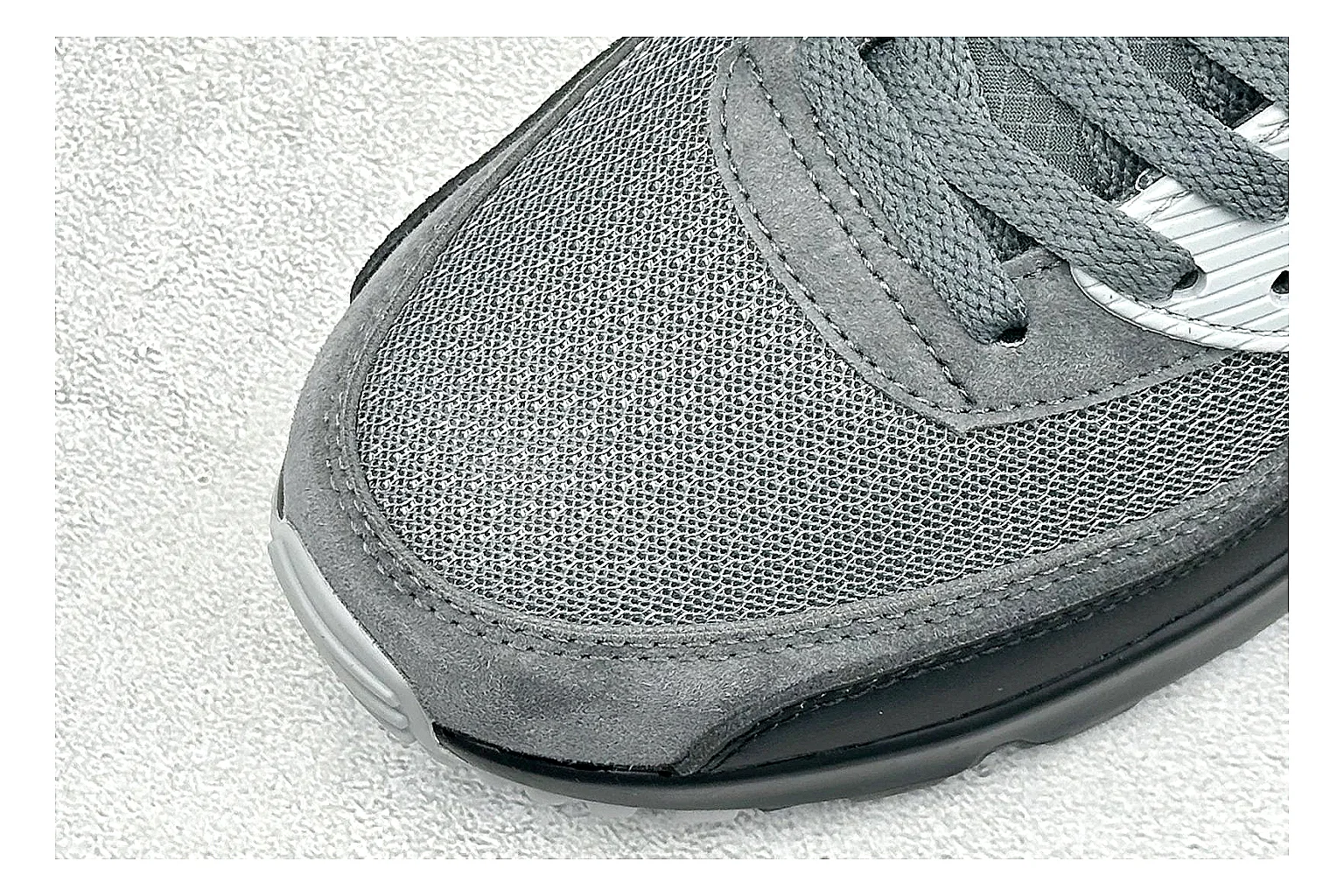 Nike Air Max 90 Grey Black spreadsheet record photo showing grey and black layered upper, visible Air window, classic Air Max 90 panels, and sturdy retro sole thumbnail 5