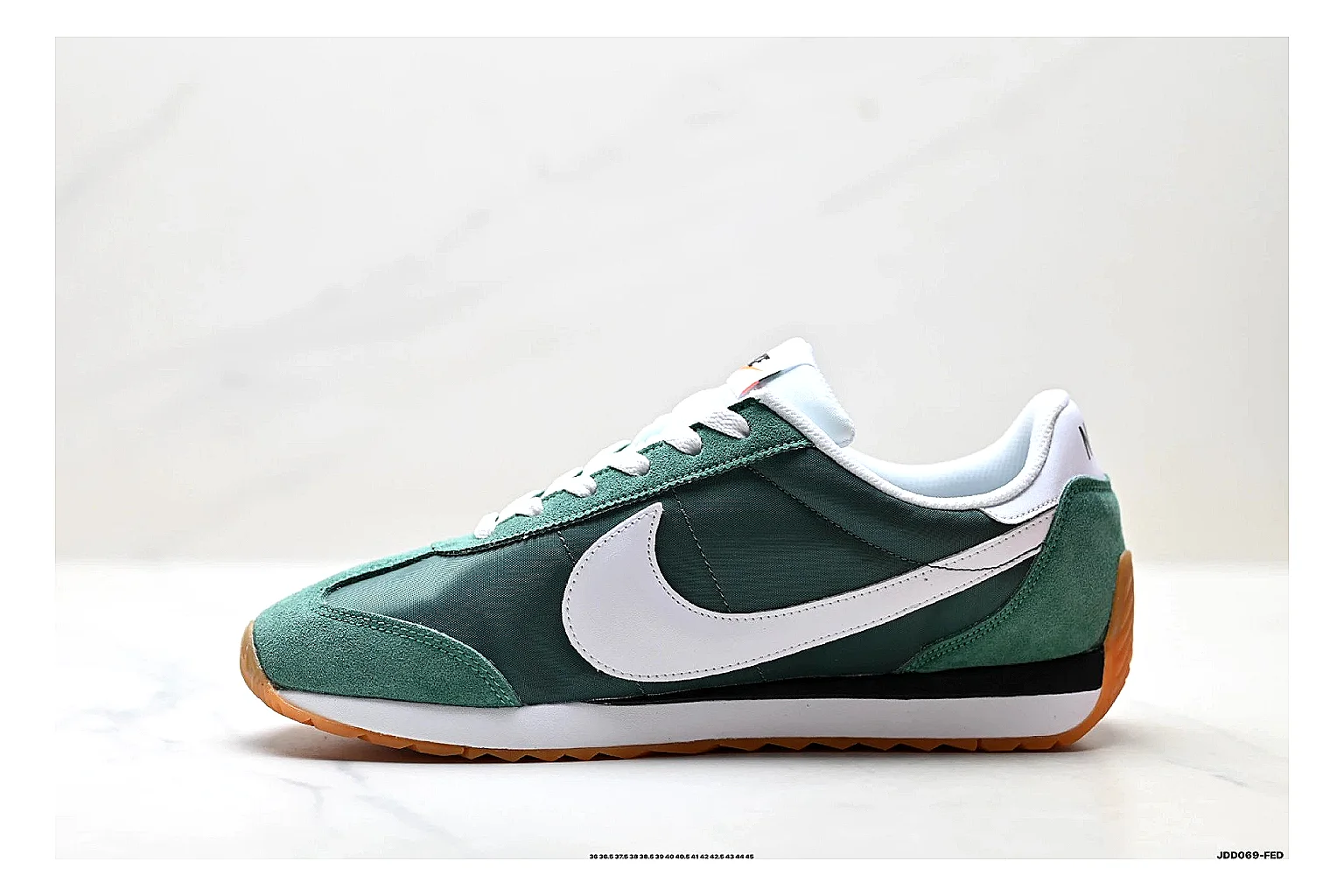 Nike Cortez Green White spreadsheet record photo showing green white leather low-top upper, slim retro runner profile, Swoosh detail, and classic Cortez sole thumbnail 2