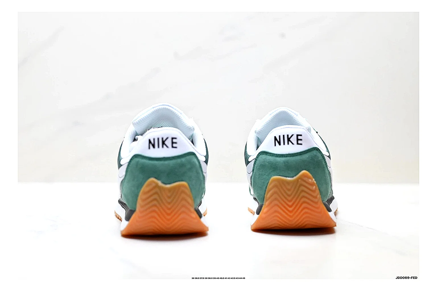 Nike Cortez Green White spreadsheet record photo showing green white leather low-top upper, slim retro runner profile, Swoosh detail, and classic Cortez sole thumbnail 3