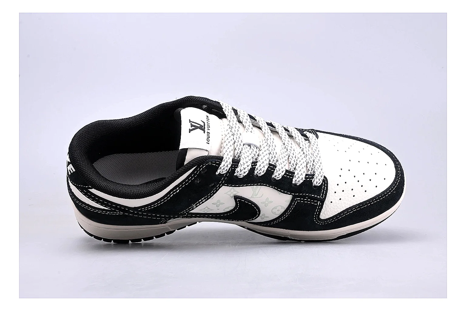 Nike Dunk Low Black White spreadsheet record photo showing black and white leather panels, low Dunk silhouette, padded collar, and basketball-retro sole thumbnail 2