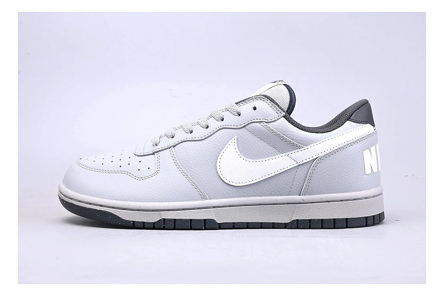 Nike Dunk Low White Gray spreadsheet record photo showing white and gray leather panels, low Dunk shape, padded collar, and basketball-retro sole
