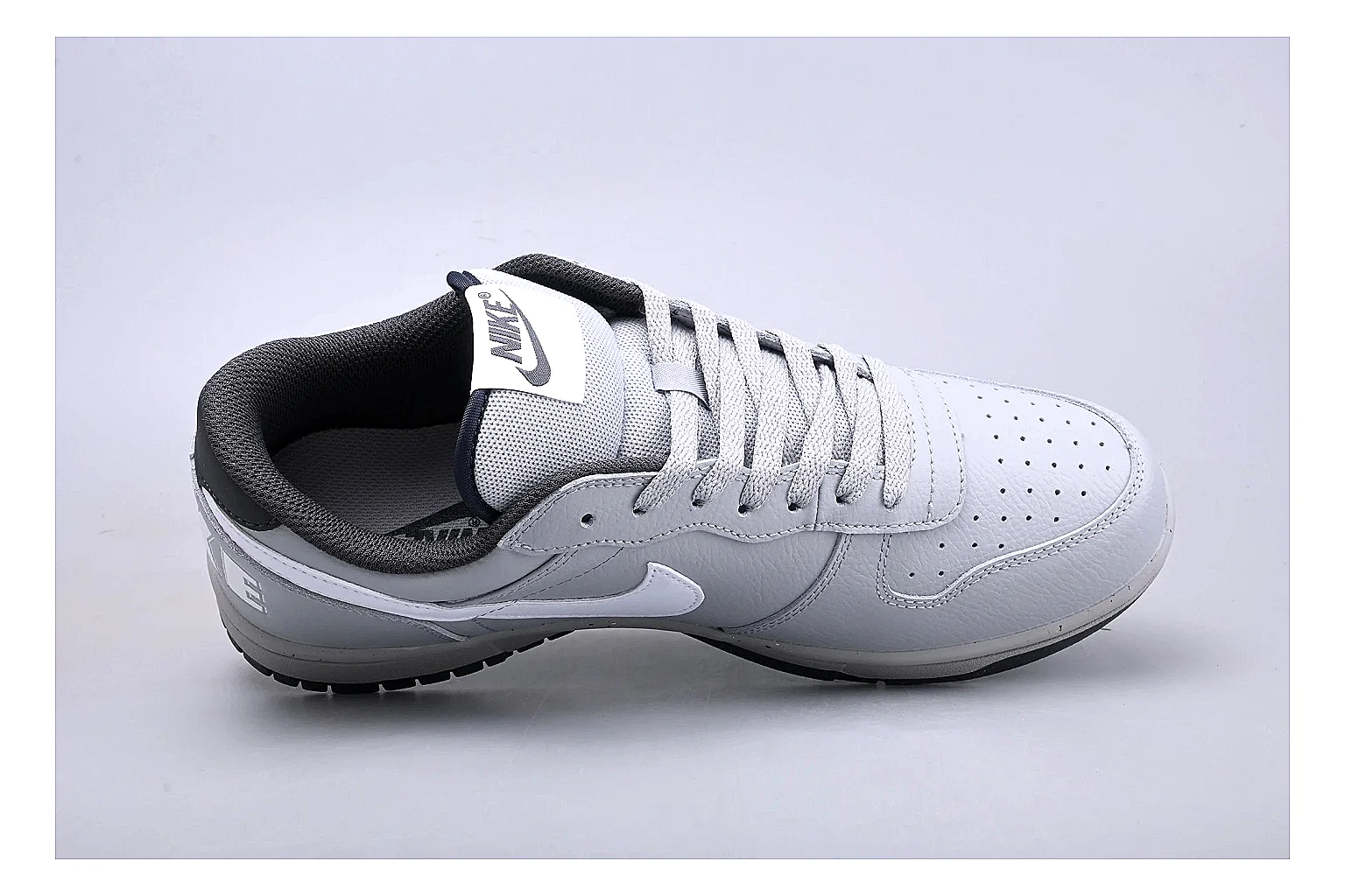 Nike Dunk Low White Gray spreadsheet record photo showing white and gray leather panels, low Dunk shape, padded collar, and basketball-retro sole thumbnail 2