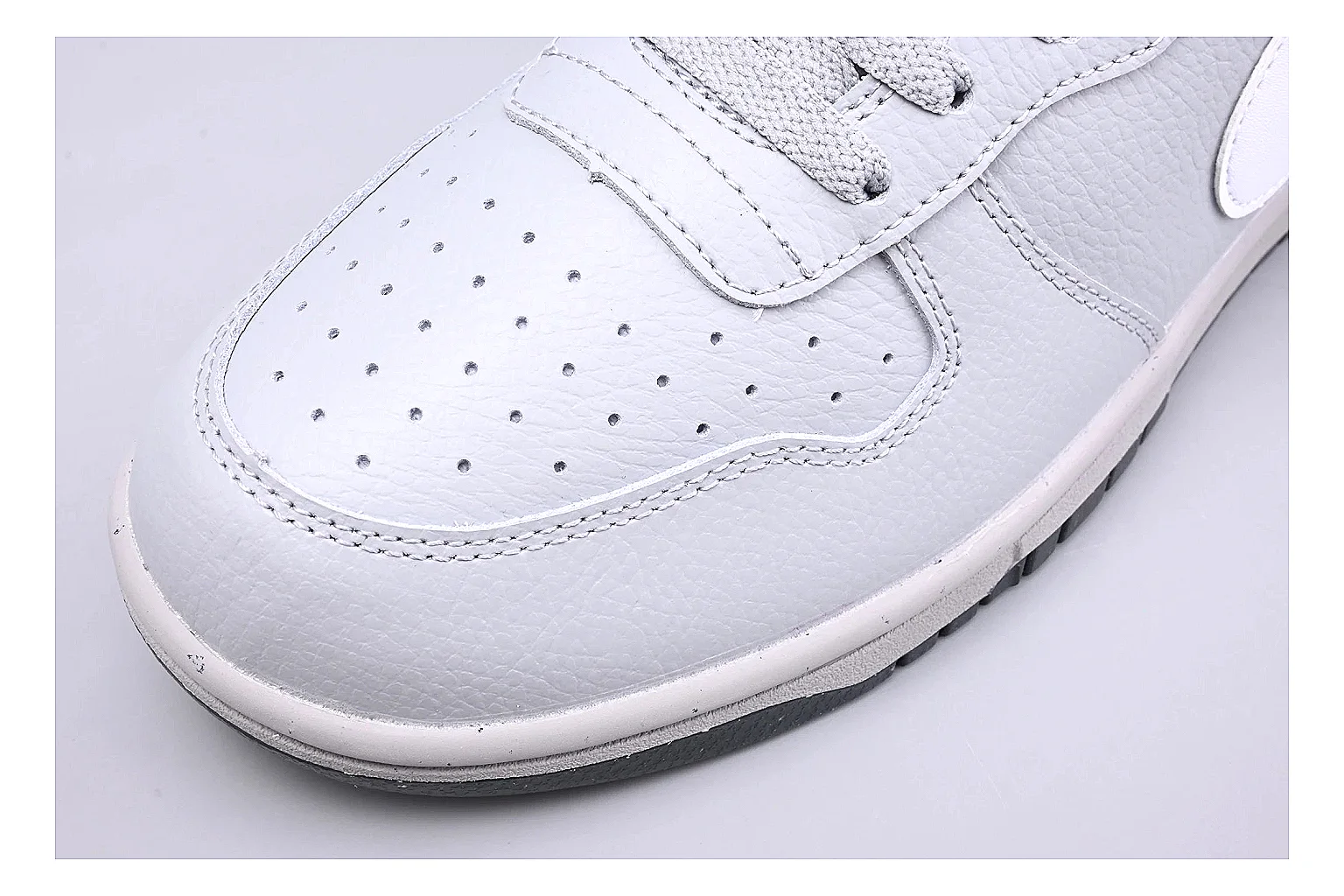 Nike Dunk Low White Gray spreadsheet record photo showing white and gray leather panels, low Dunk shape, padded collar, and basketball-retro sole thumbnail 5