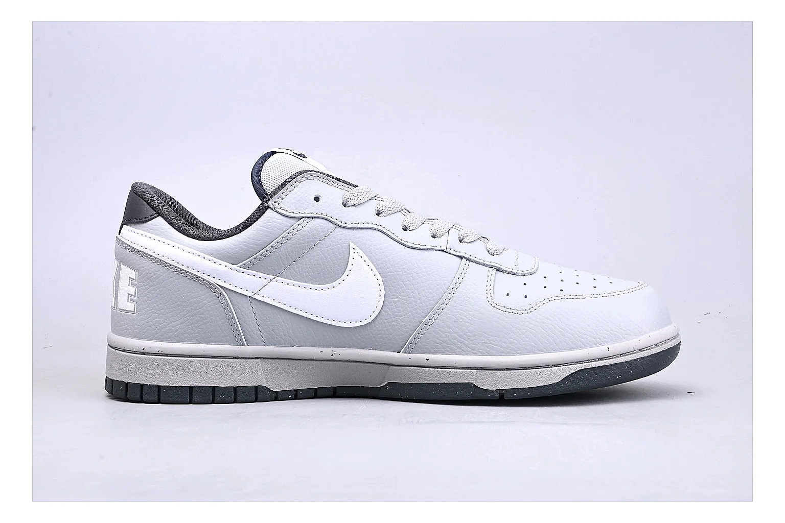 Nike Dunk Low White Gray spreadsheet record photo showing white and gray leather panels, low Dunk shape, padded collar, and basketball-retro sole thumbnail 6
