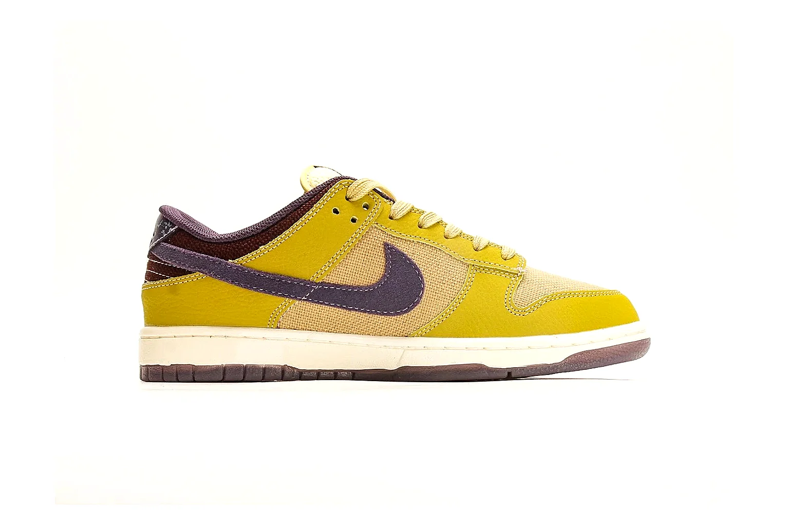 Nike Dunk Low Yellow Purple spreadsheet record photo showing yellow and purple leather panels, dark Swoosh, heel overlay, cream midsole, and brown outsole thumbnail 6