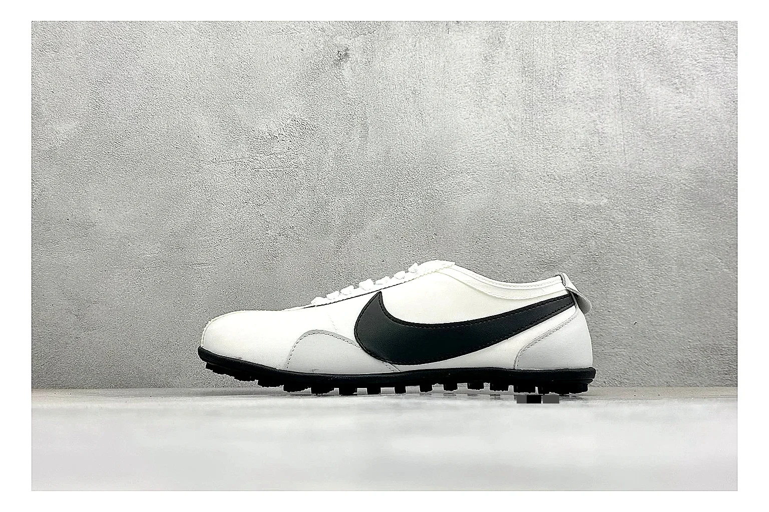 Nike Moon Shoe OG White Black spreadsheet record image showing white upper, black Swoosh, slim retro runner shape, and waffle-style outsole