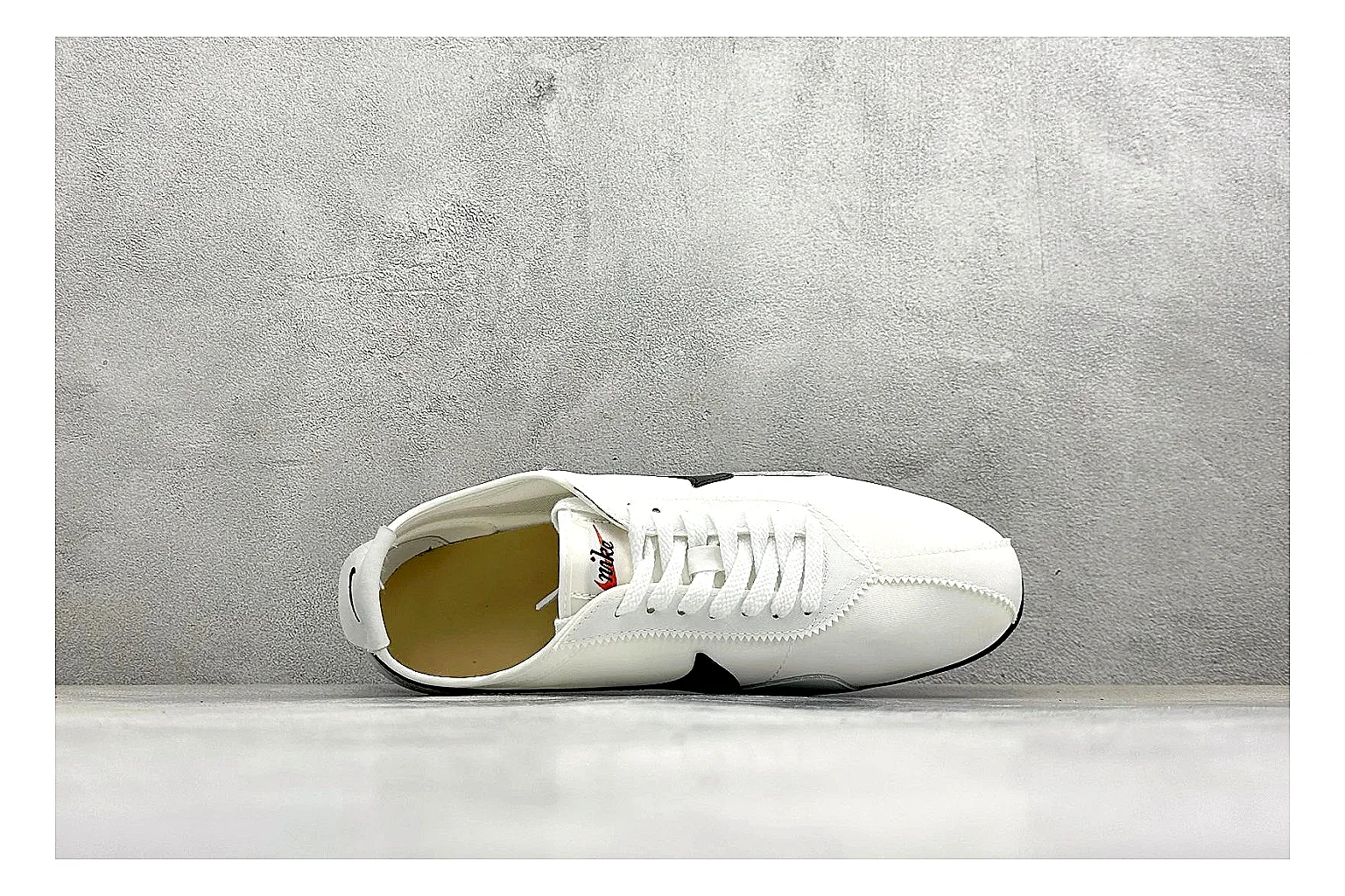 Nike Moon Shoe OG White Black spreadsheet record image showing white upper, black Swoosh, slim retro runner shape, and waffle-style outsole thumbnail 2