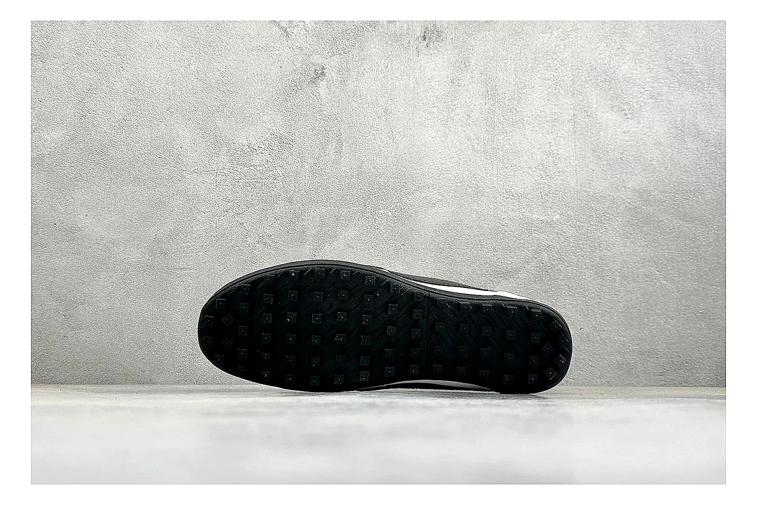 Nike Moon Shoe OG White Black spreadsheet record image showing white upper, black Swoosh, slim retro runner shape, and waffle-style outsole