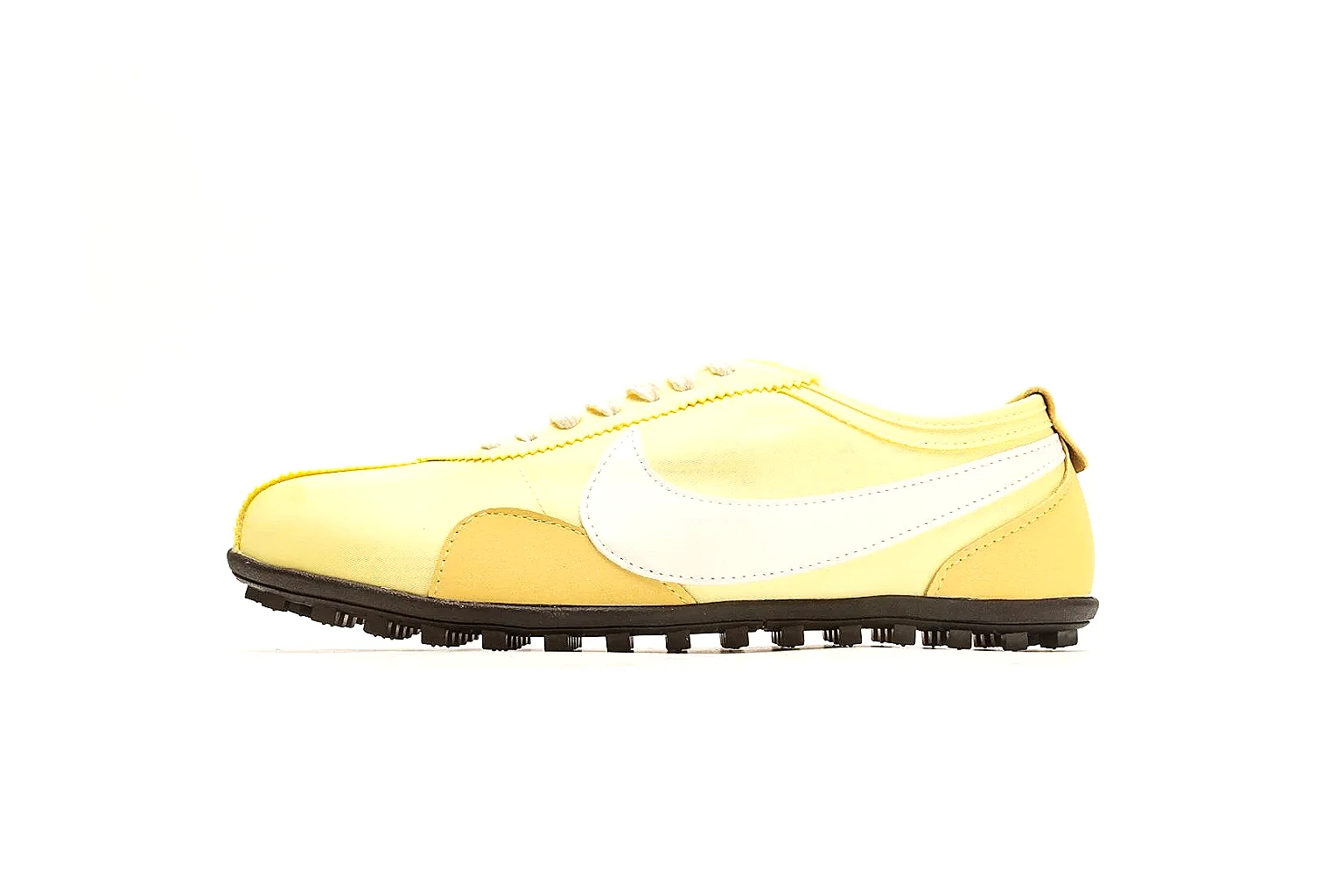 Nike Moon Yellow Retro Runner spreadsheet record photo showing yellow slim runner upper, white Swoosh, low retro profile, white midsole, and black waffle outsole