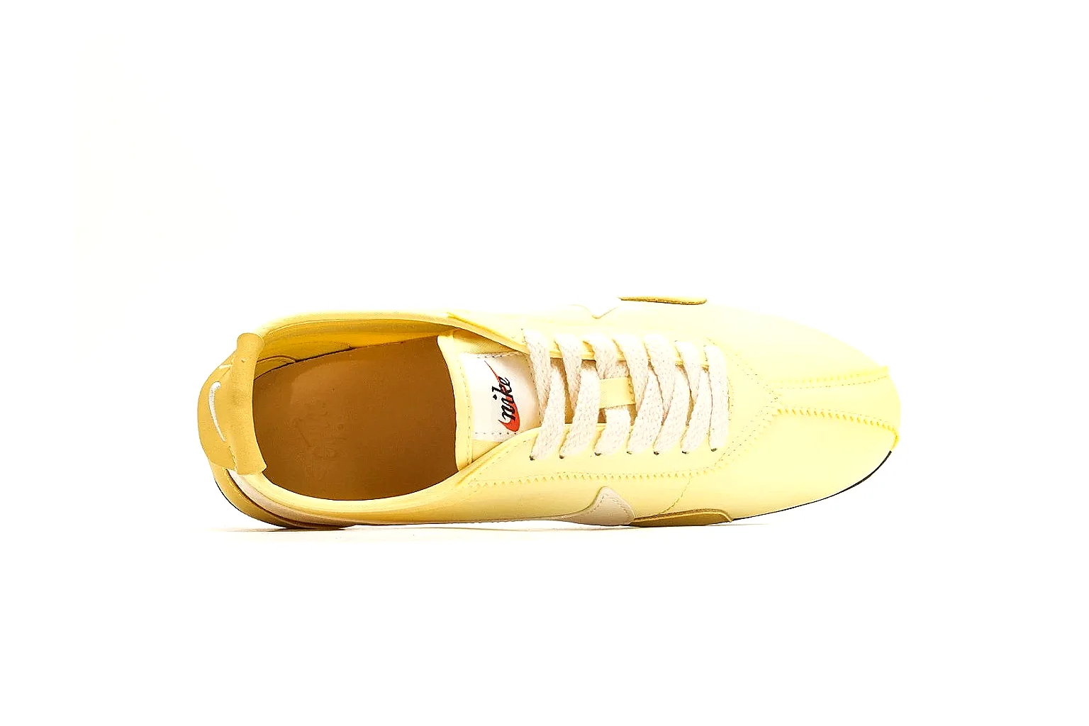 Nike Moon Yellow Retro Runner spreadsheet record photo showing yellow slim runner upper, white Swoosh, low retro profile, white midsole, and black waffle outsole thumbnail 2