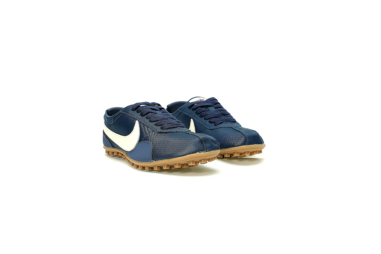 Kako Sheetbase record image for Nike Navy Gum Low Court Sneaker