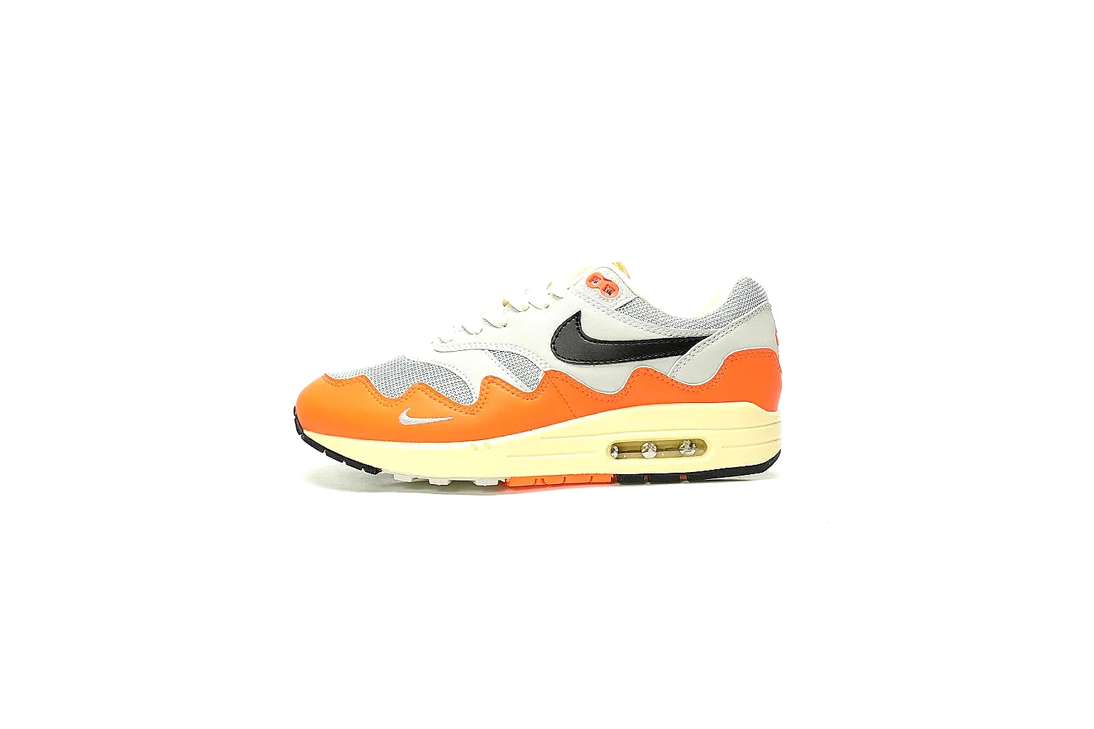 Kako Sheetbase record image for Nike Orange Cream Retro Runner Sneaker