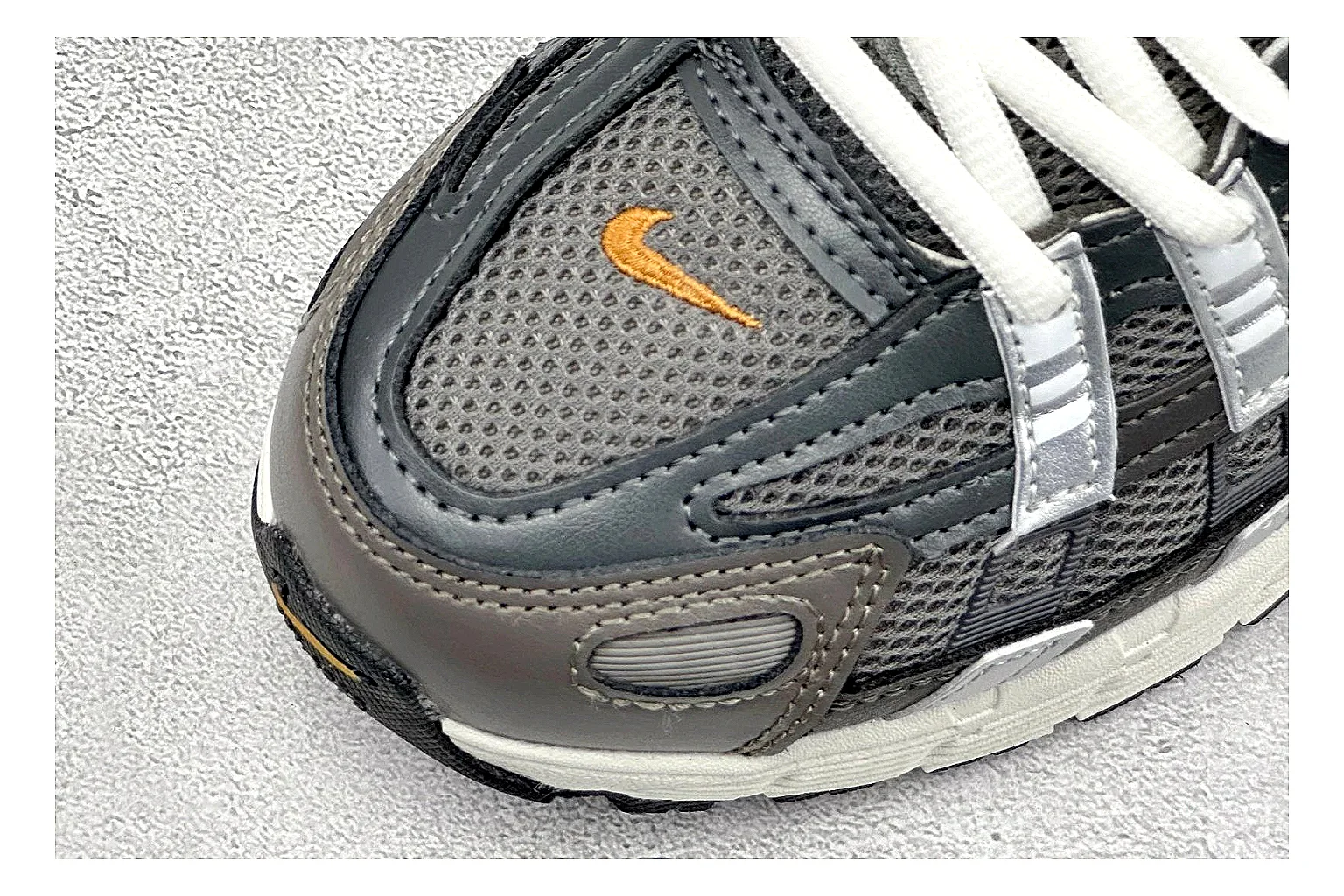 Nike P-6000 Black Orange spreadsheet record photo showing black layered runner upper, orange accent hits, retro P-6000 paneling, and cushioned casual sole thumbnail 5