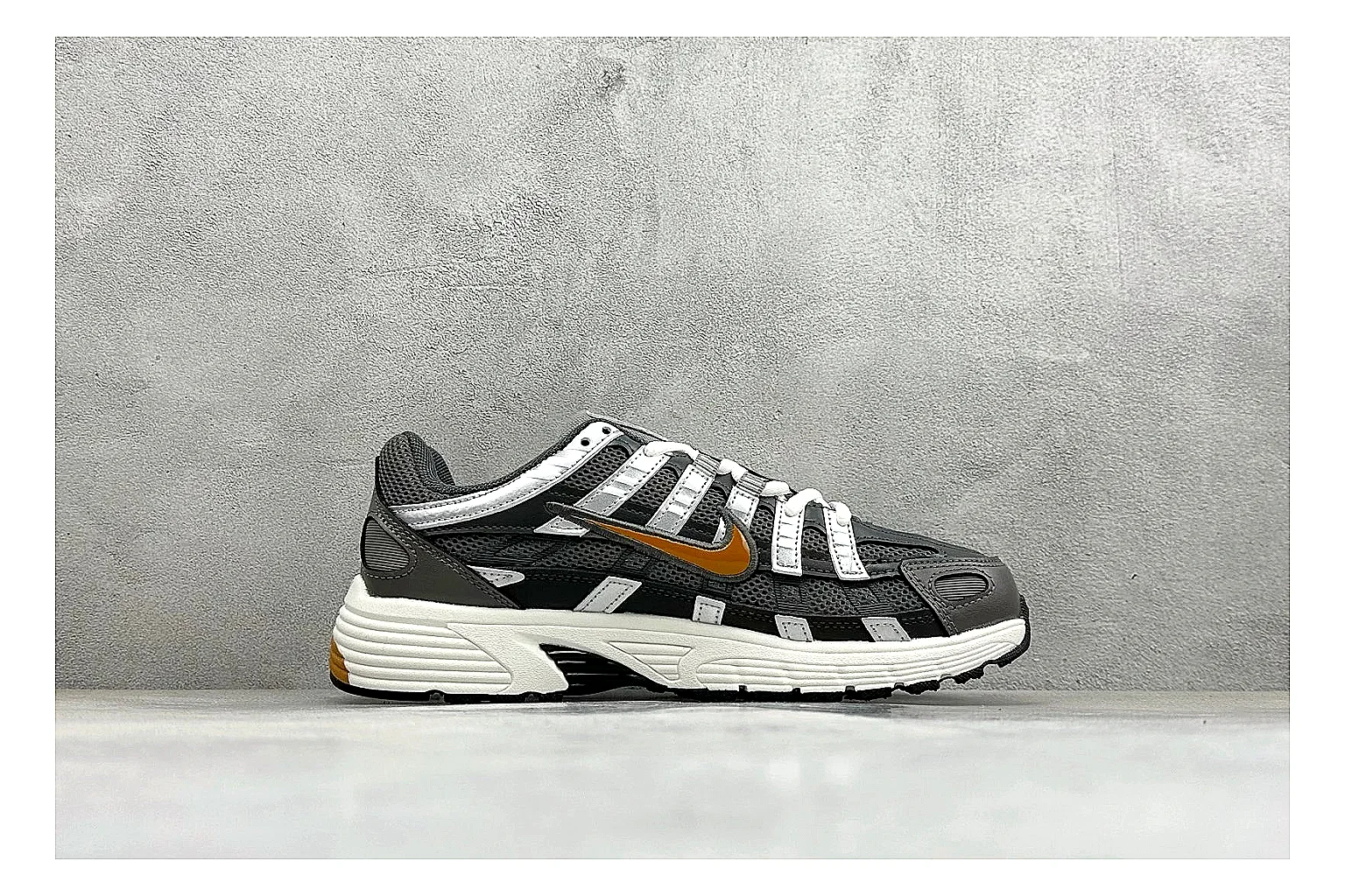 Nike P-6000 Black Orange spreadsheet record photo showing black layered runner upper, orange accent hits, retro P-6000 paneling, and cushioned casual sole thumbnail 6