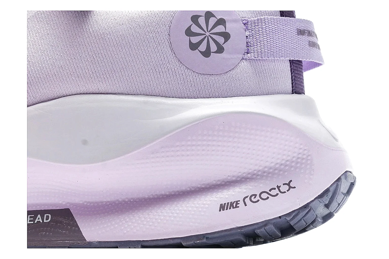Nike ReactX GORE-TEX Lilac Sneakers spreadsheet record photo showing lilac textile upper, small Swoosh, heel pull tabs, cushioned ReactX-style sole, and weather-ready low profile thumbnail 5