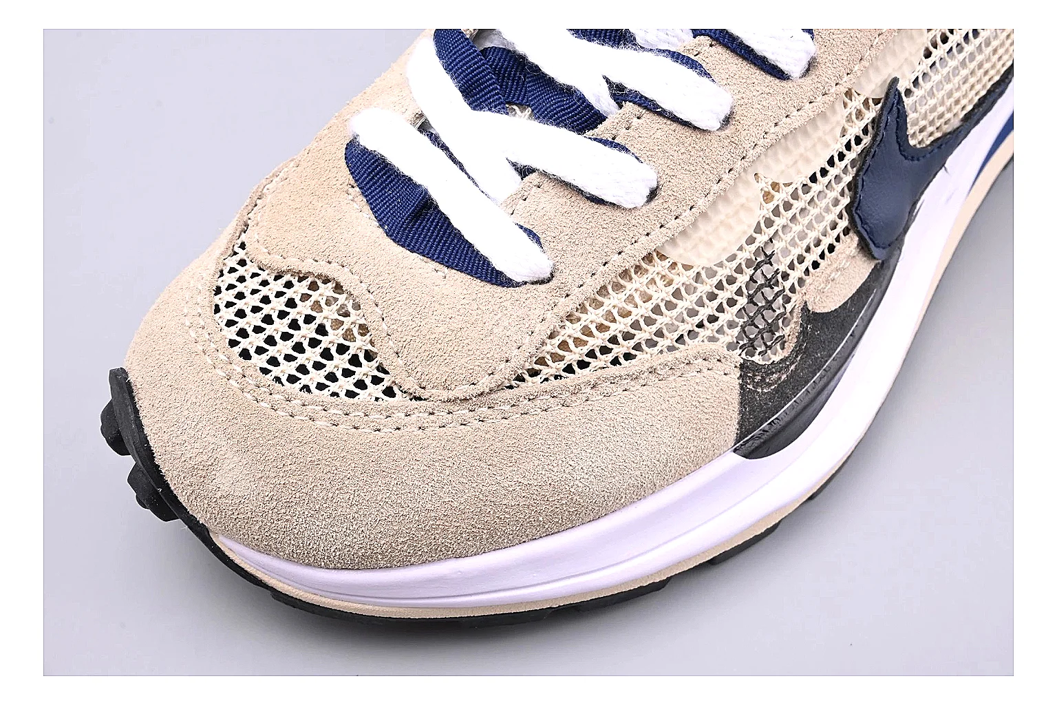 Nike Retro Runner Beige Blue spreadsheet record photo showing beige suede-mesh runner upper, blue accent panels, low retro profile, and cushioned running sole thumbnail 5