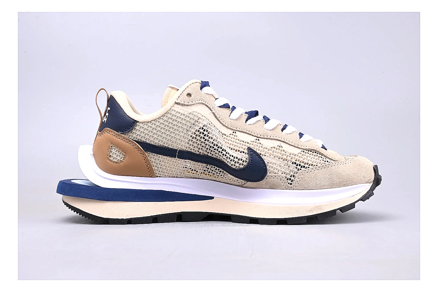 Nike Retro Runner Beige Blue spreadsheet record photo showing beige suede-mesh runner upper, blue accent panels, low retro profile, and cushioned running sole thumbnail 6
