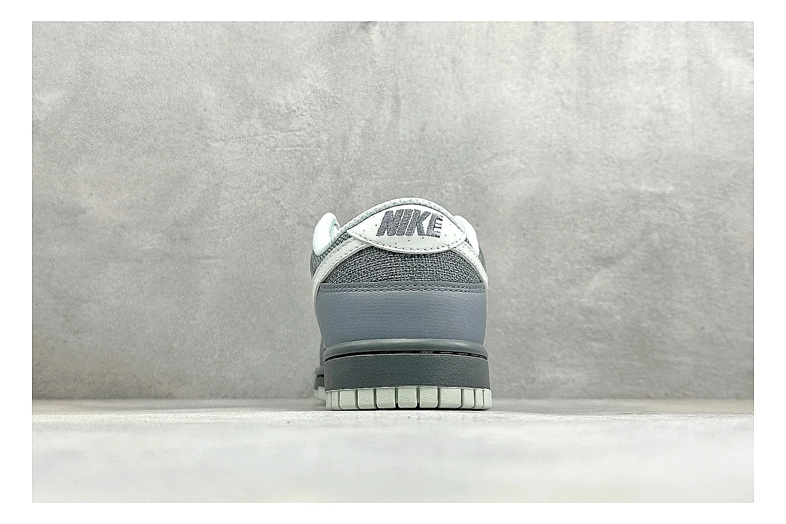 Nike SB Dunk Low Grey spreadsheet record photo showing grey low-top skate upper, white Swoosh, padded collar, and classic Dunk sole thumbnail 3