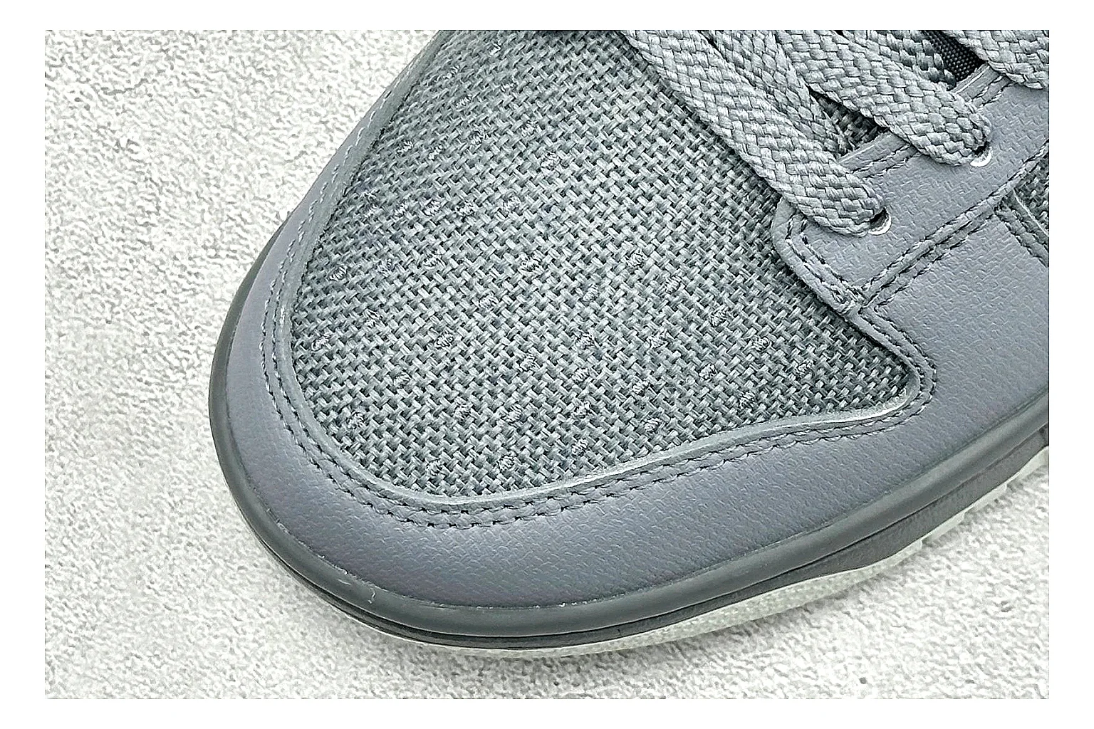 Nike SB Dunk Low Grey spreadsheet record photo showing grey low-top skate upper, white Swoosh, padded collar, and classic Dunk sole thumbnail 5