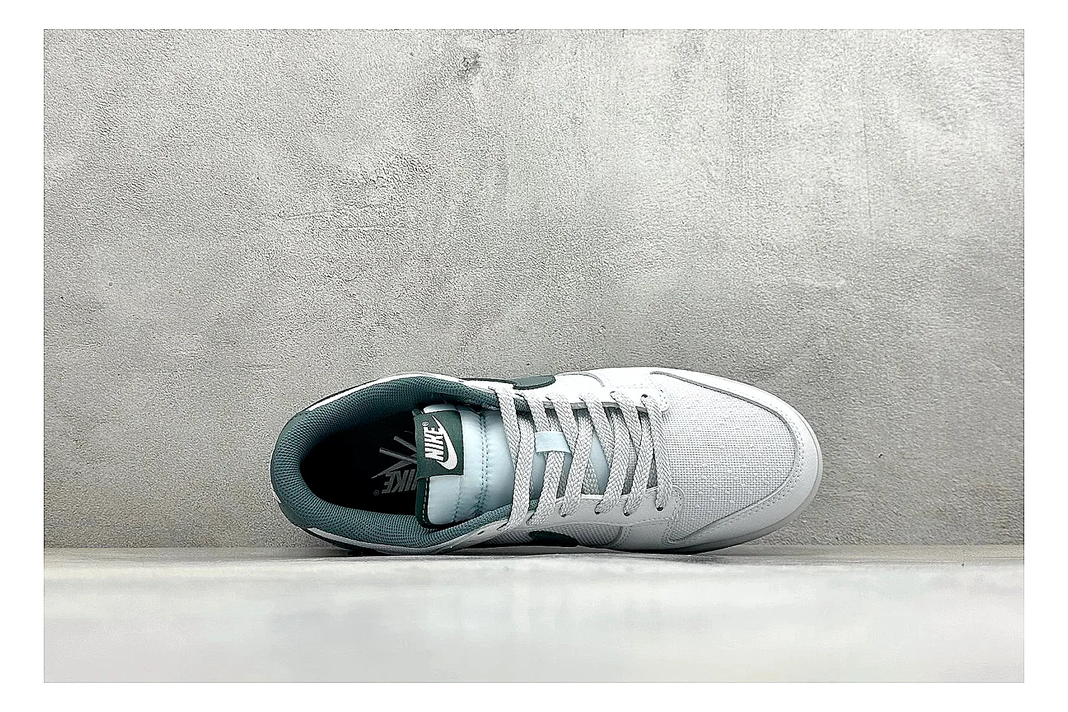 Nike SB Dunk Low White Green spreadsheet record photo showing white low-top skate upper, green Swoosh, padded collar, and classic Dunk sole shape thumbnail 2