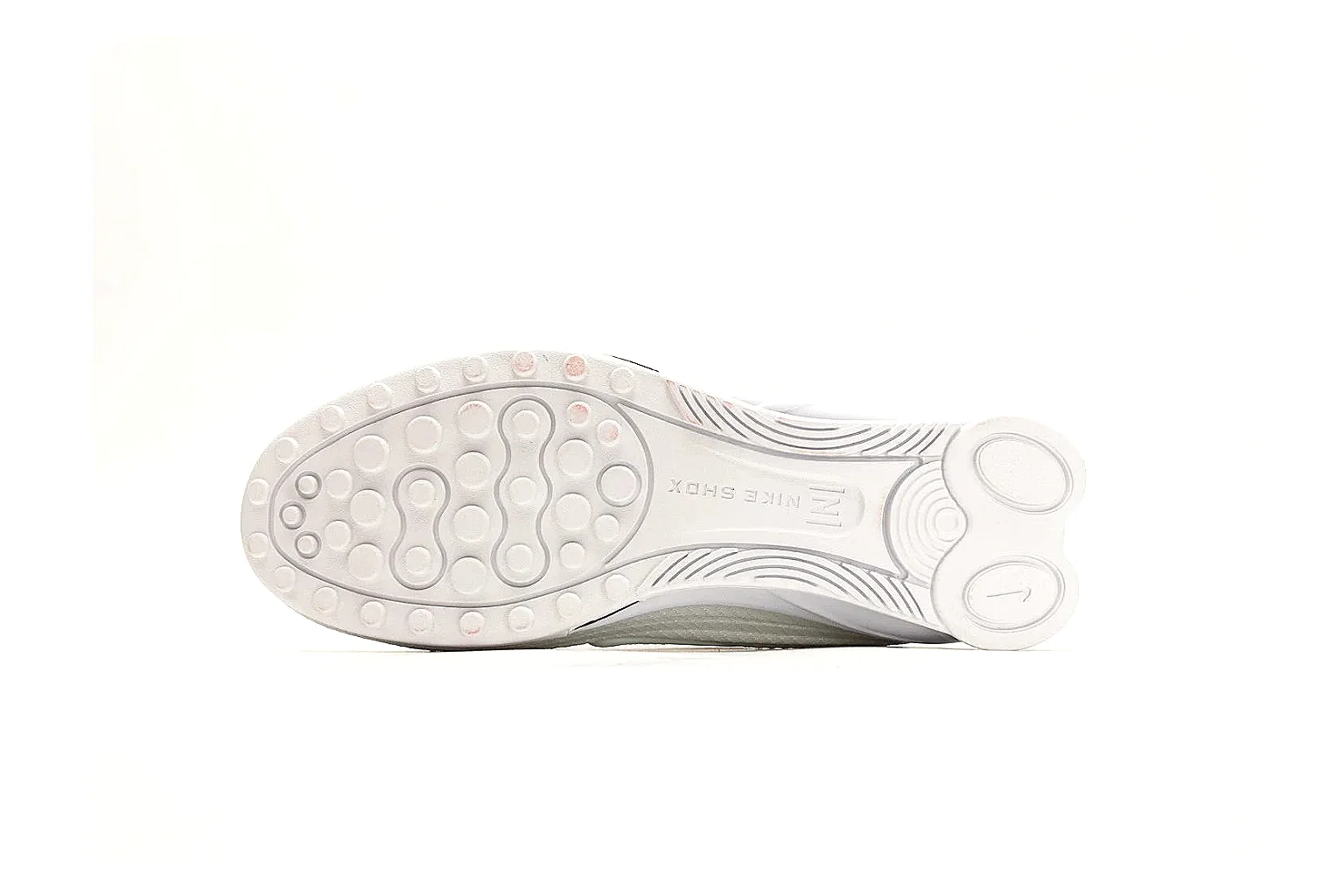 Nike Shox Z White Sneakers spreadsheet record photo showing white streamlined layered upper, small Swoosh, black heel cushioning columns, and modern low runner shape