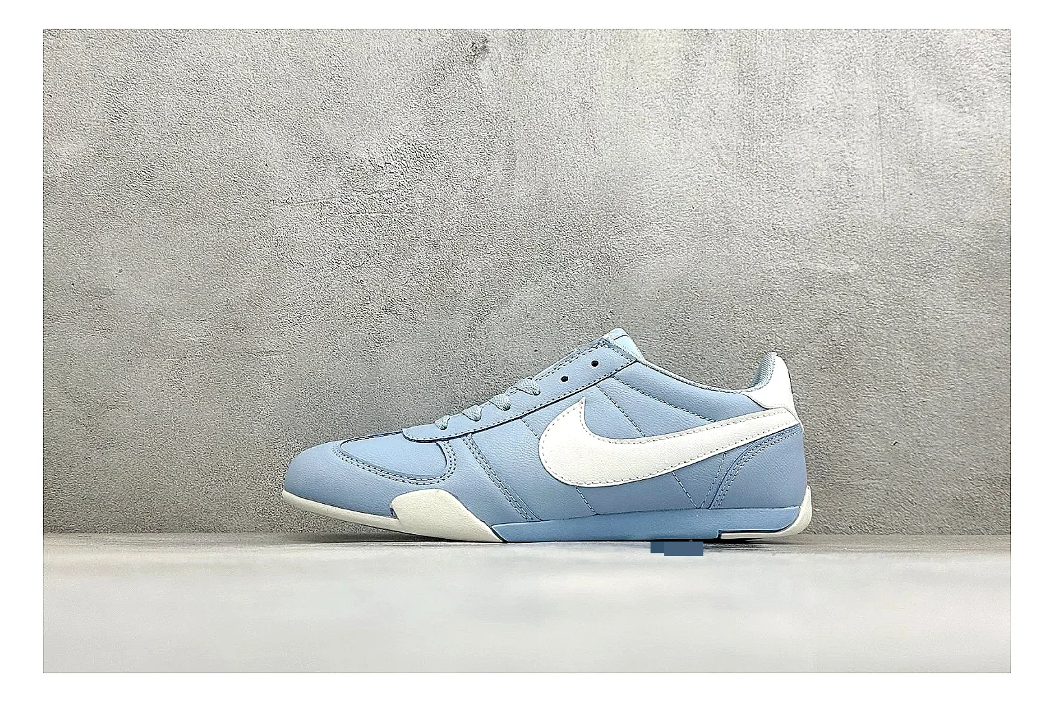 Nike Sprint Sister Light Blue spreadsheet record photo showing light blue retro-runner upper, slim side profile, tonal panels, and low everyday sole