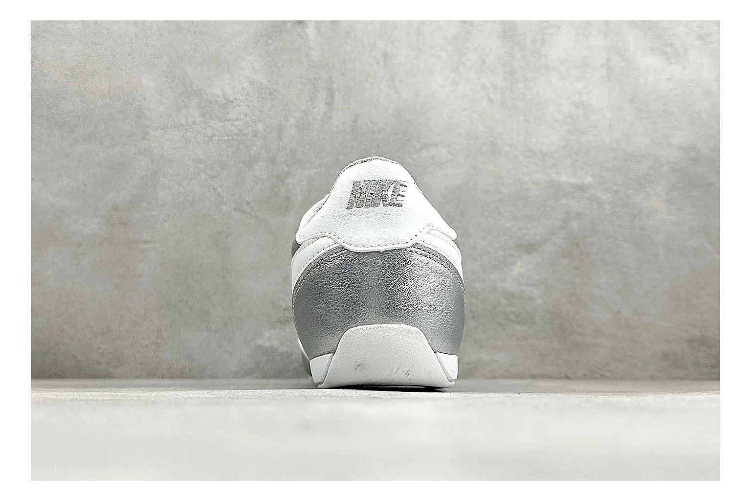 Nike Sprint Sister Silver spreadsheet record photo showing silver retro-runner upper, slim low-top shape, layered side panels, and a light everyday sole thumbnail 3