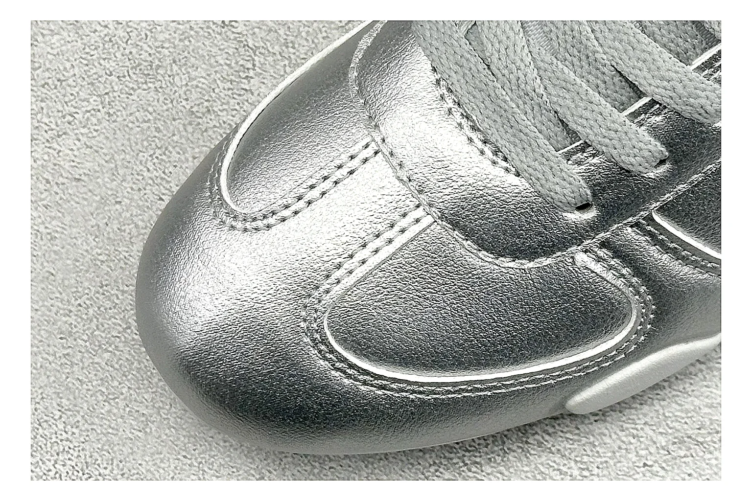 Nike Sprint Sister Silver spreadsheet record photo showing silver retro-runner upper, slim low-top shape, layered side panels, and a light everyday sole thumbnail 5