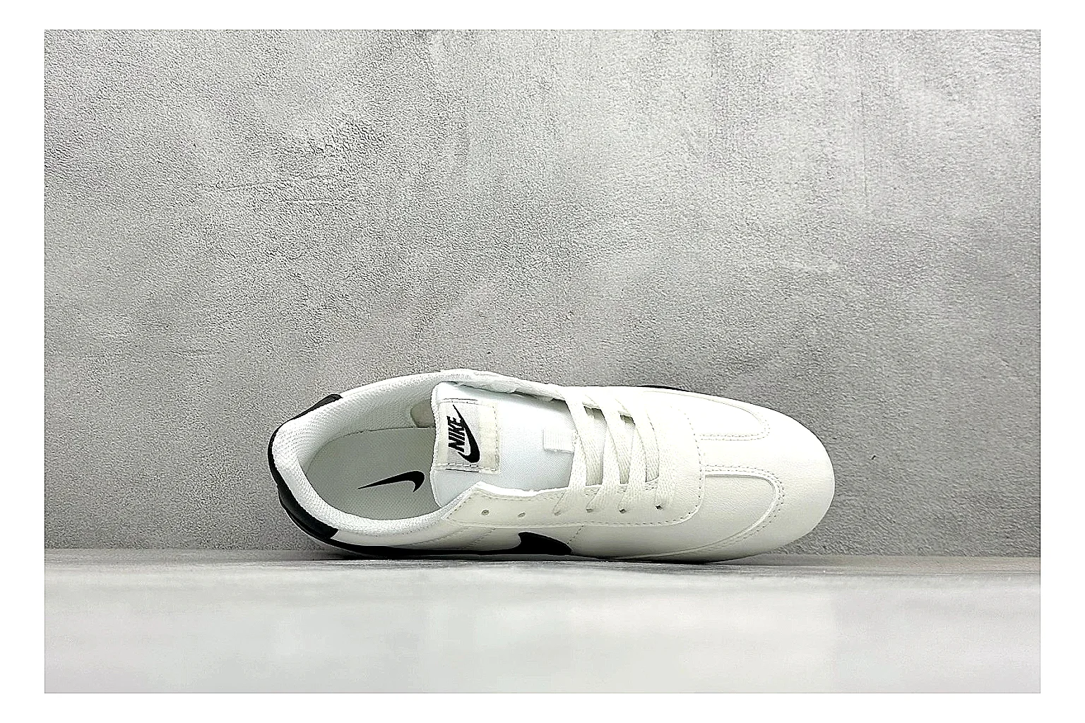 Nike Sprint Sister White Black spreadsheet record photo showing white retro-runner upper, black Swoosh contrast, slim low-top profile, and light casual sole thumbnail 2
