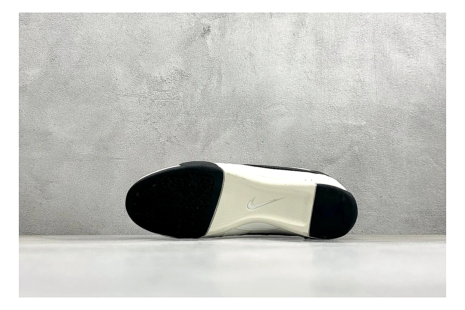 Nike Sprint Sister White Black spreadsheet record photo showing white retro-runner upper, black Swoosh contrast, slim low-top profile, and light casual sole