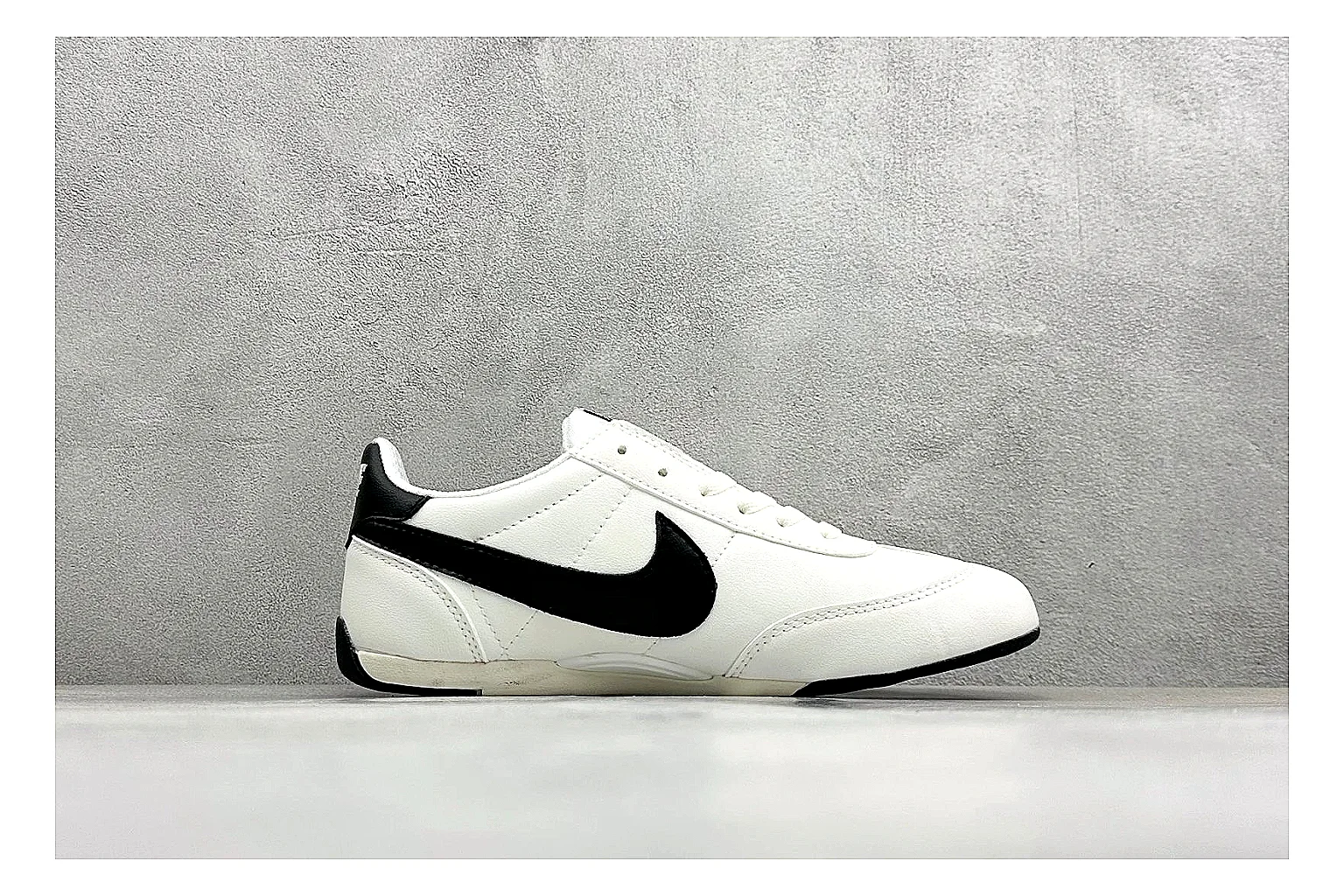 Nike Sprint Sister White Black spreadsheet record photo showing white retro-runner upper, black Swoosh contrast, slim low-top profile, and light casual sole thumbnail 6